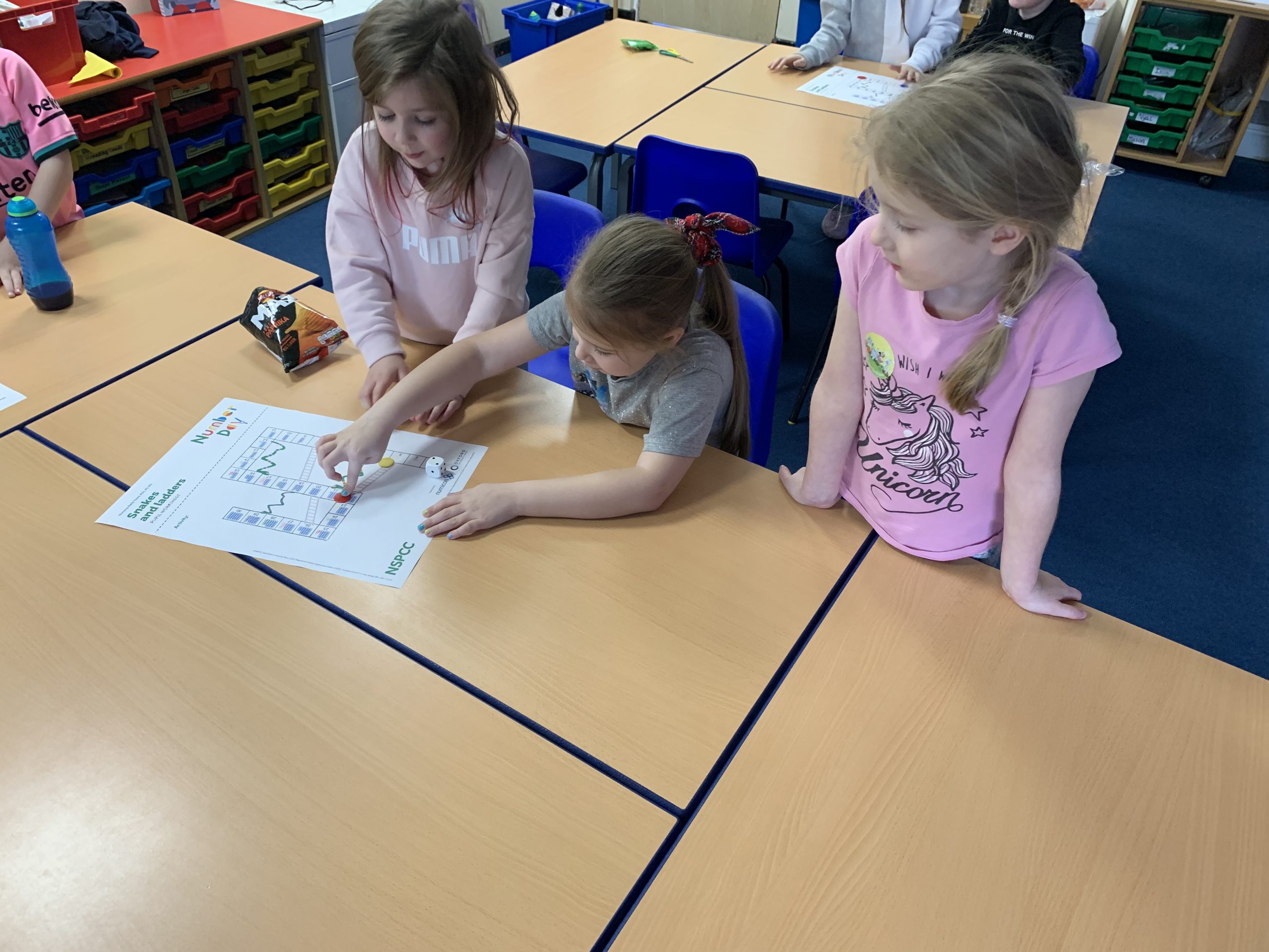 Year 2 children solving maths problems for number day