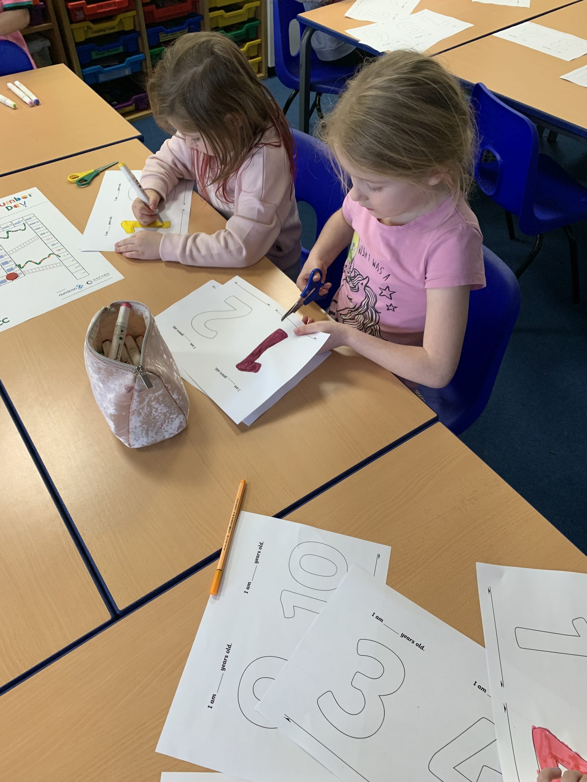 Year 2 children solving maths problems for number day