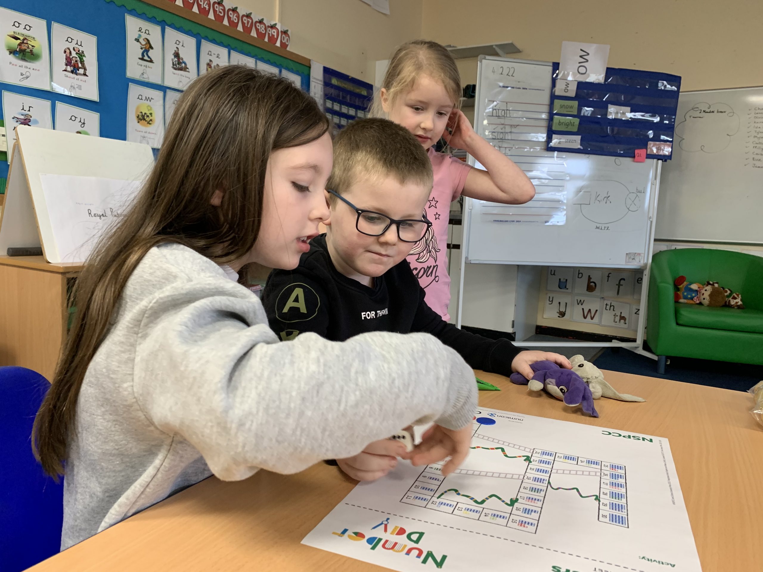 Year 2 children solving maths problems for number day