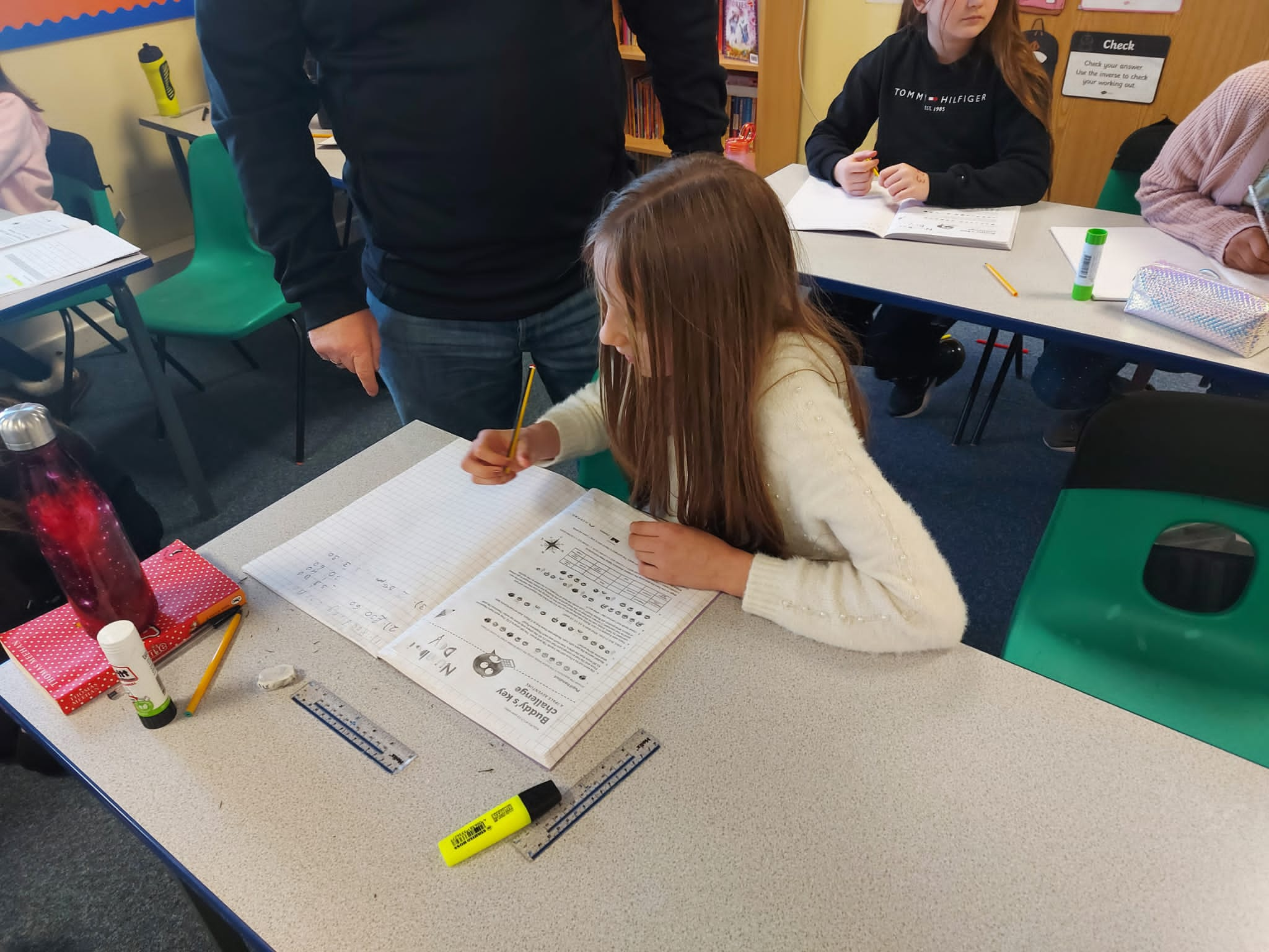 Year 6 children taking part in an activity for number day