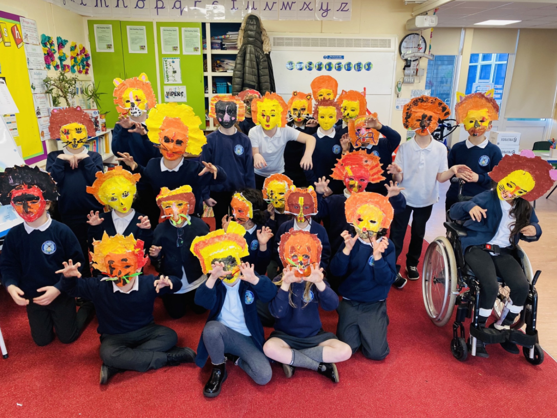 Year 3 wearing their finished masks