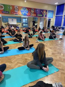 Year 6 children taking part in their yoga session