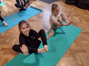 Year 3 children taking part in their yoga session