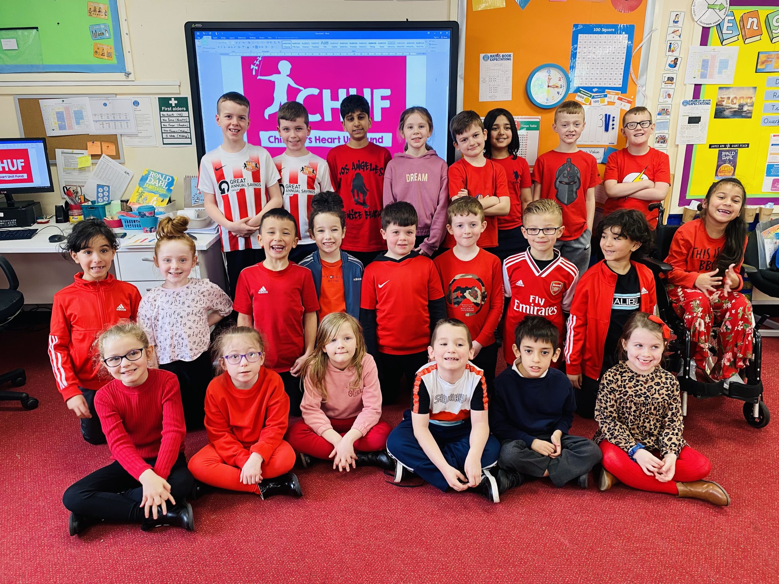 Year 3 children wearing red for CHUF