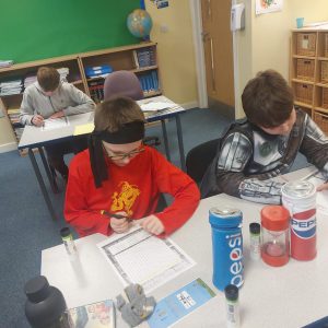 Year 6 completing an activity for World Book Day 2022