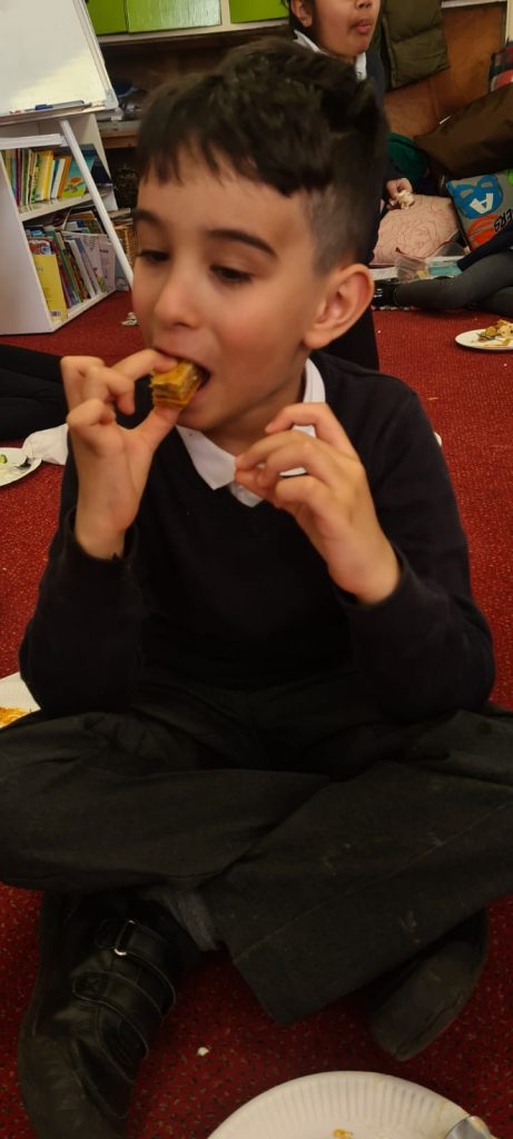 Year 3 sampling Greek food as part of their essential learning experience