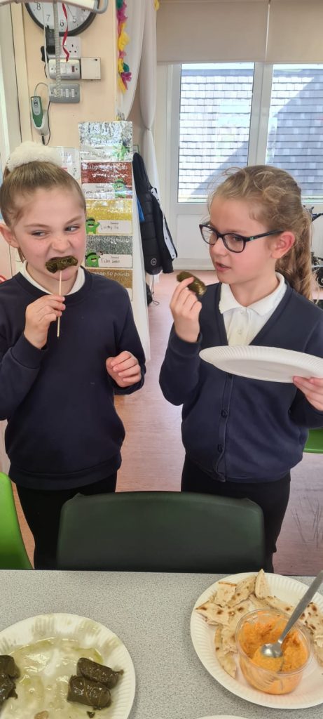 Year 3 sampling Greek food as part of their essential learning experience