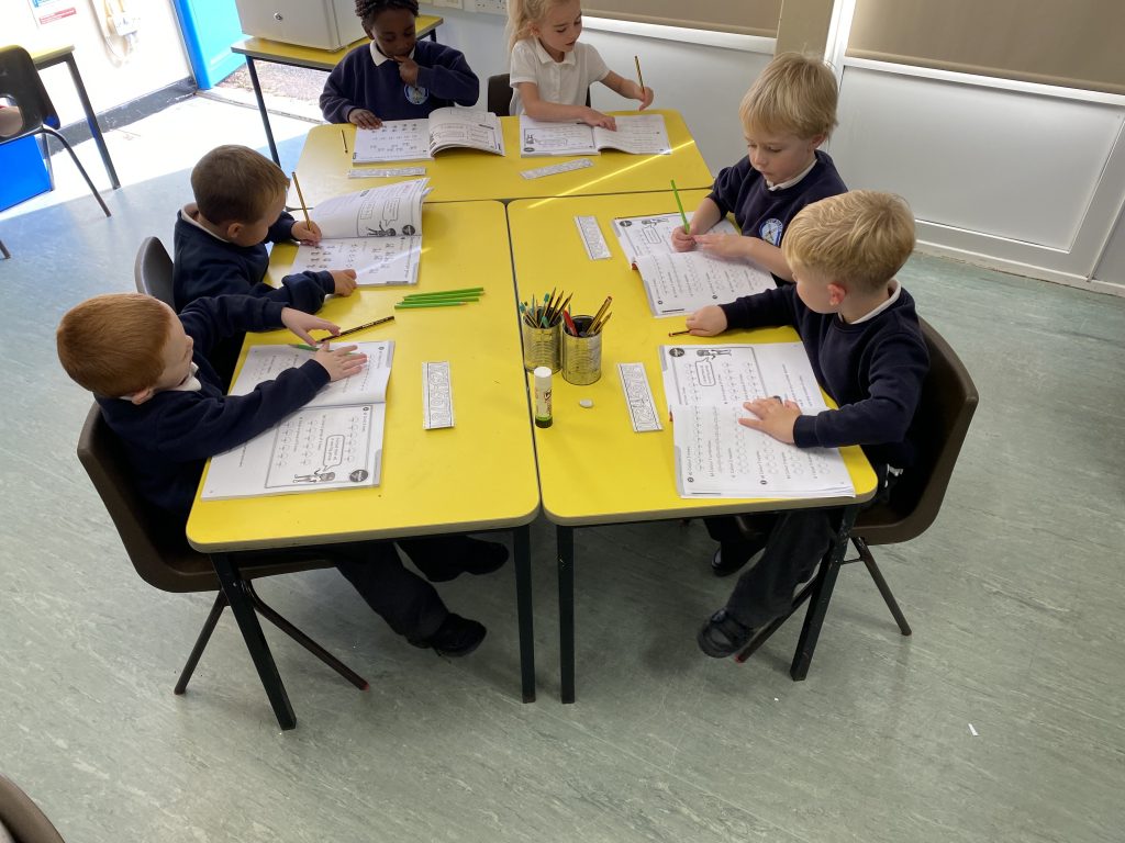 Year 1 children working independently in maths