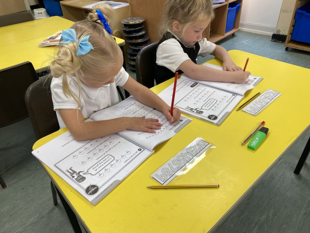 Year 1 children working independently in maths