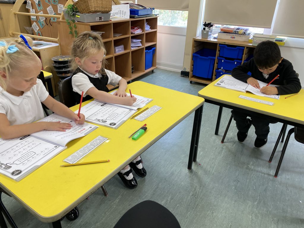 Year 1 children working independently in maths