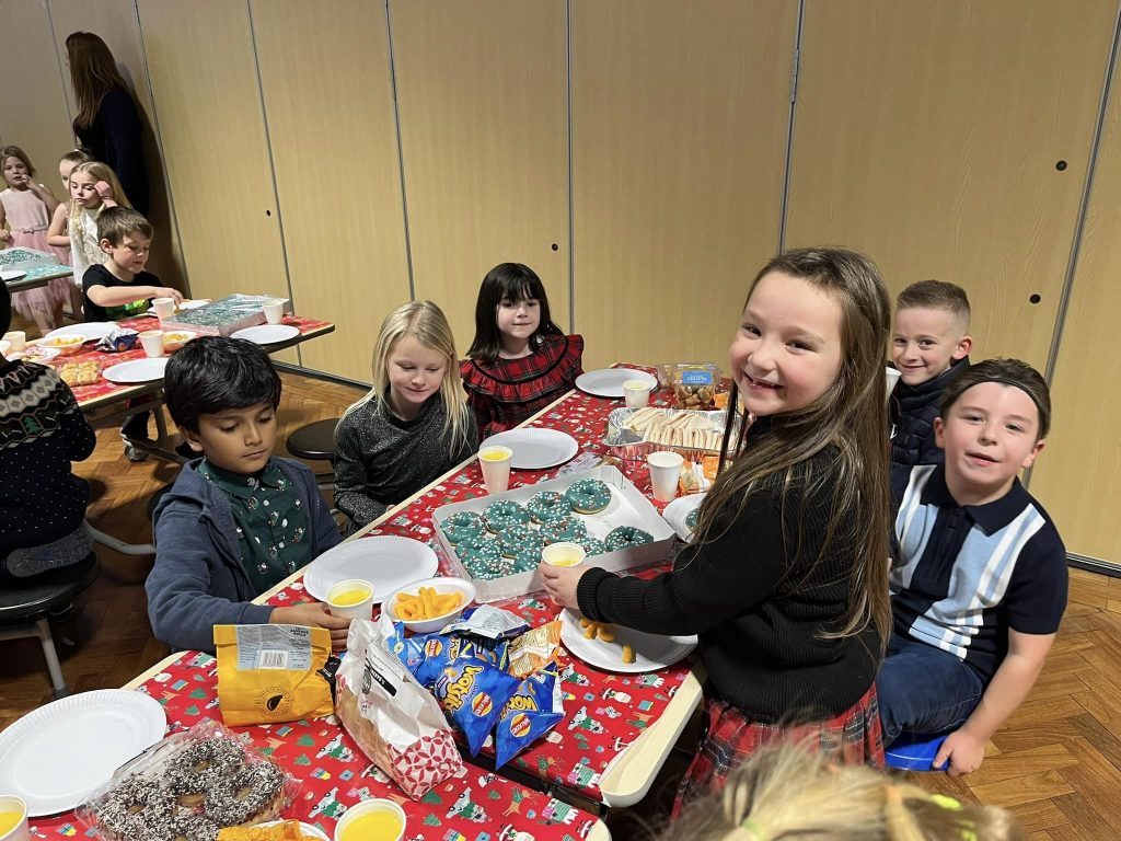 Year 1 and 2 enjoying their christmas party