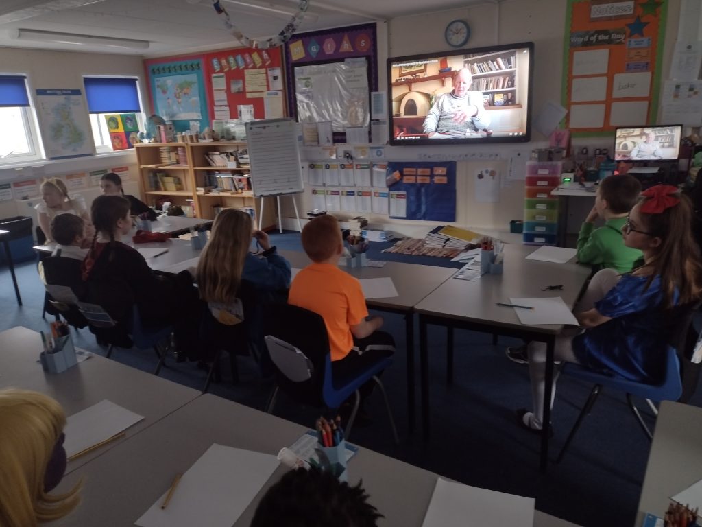 Year 5 watching a webinar with Michael Morpurgo for World Book Day